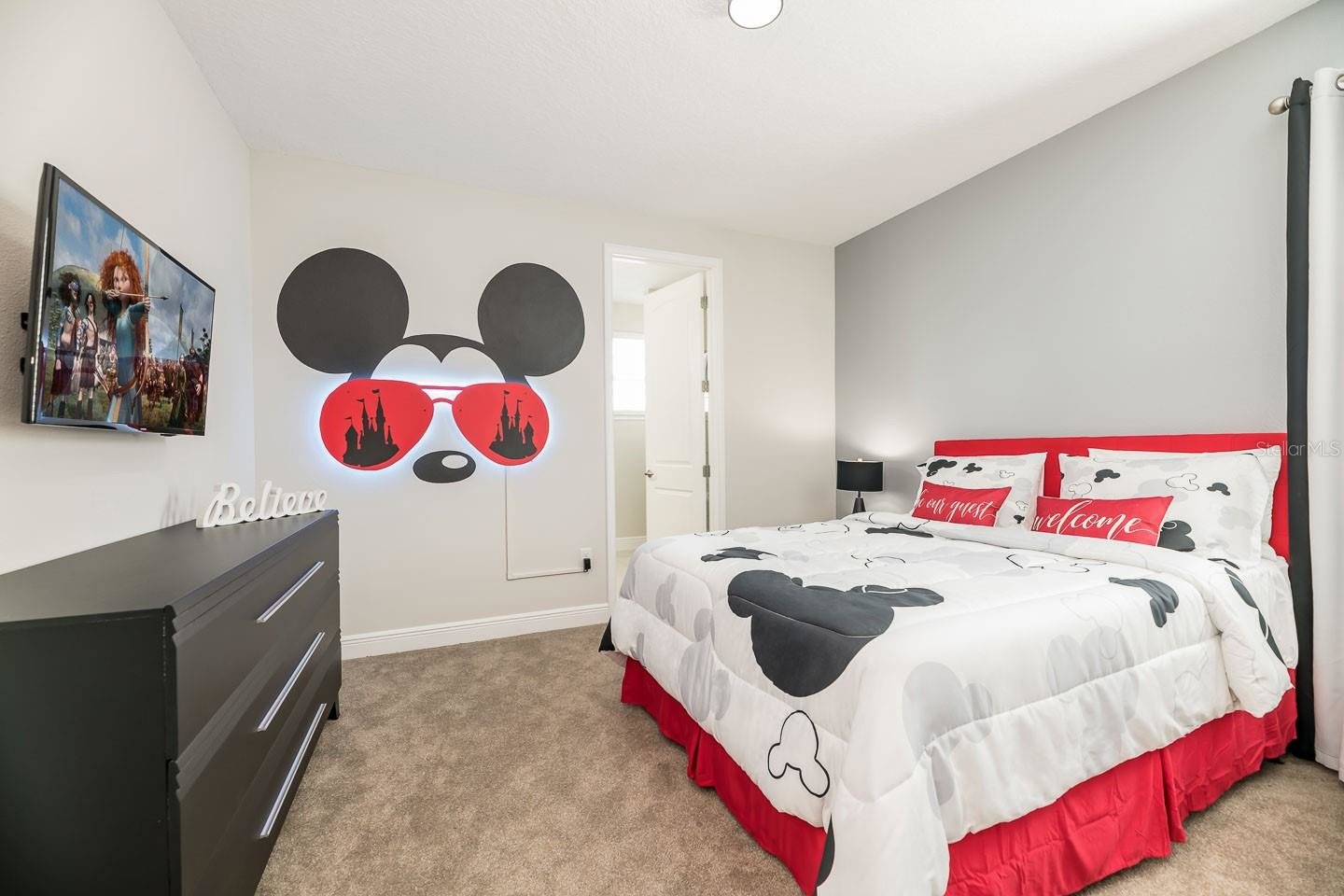 black, white, and red mickey mouse bedroom